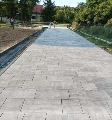 Maytrans - maszynowe układanie kostki Skawina